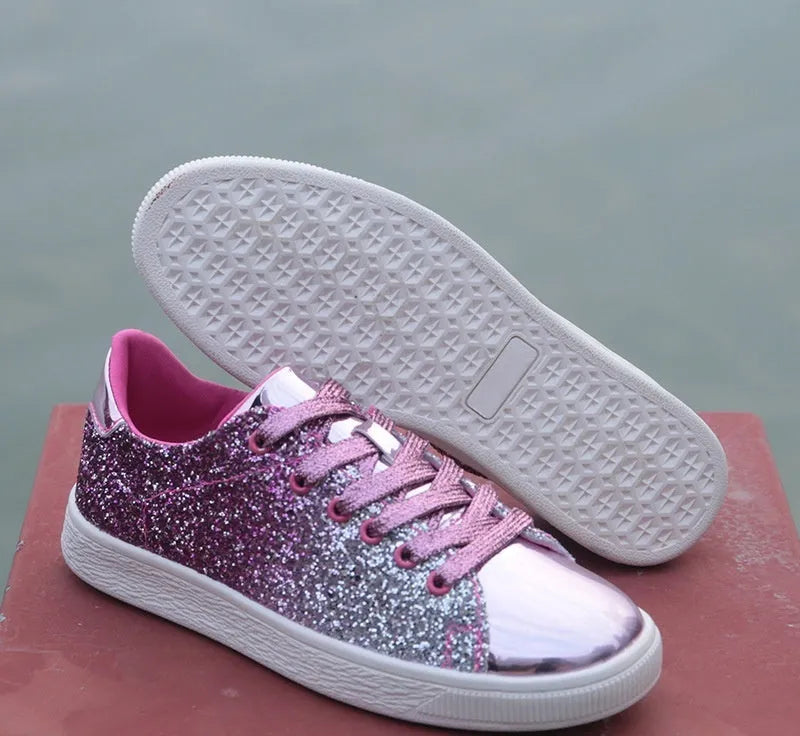 Women's casual low-top sequin shoes in gold with lace-up front and round toe.