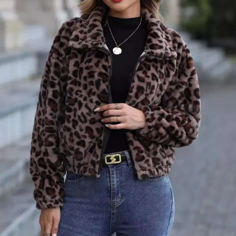 Women's loose leopard print plush coat with a zip front and raglan sleeves.