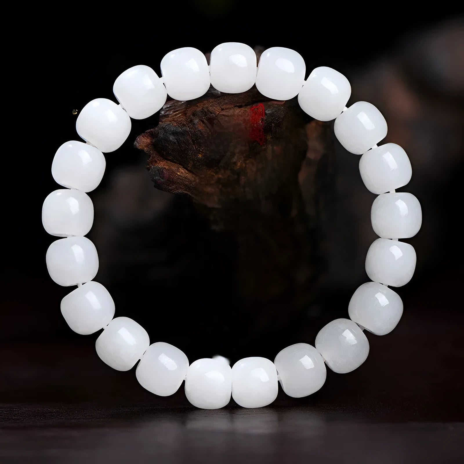 White Hetian jade barrel bead bracelet for men and women showing polished beads.