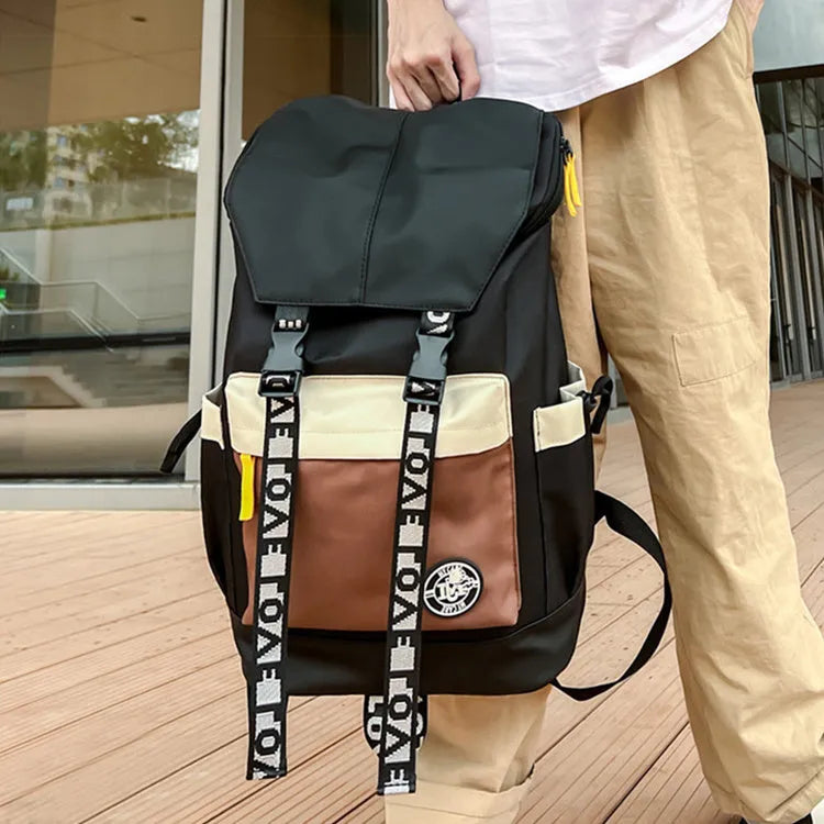 Oxford cloth backpack in black, green, or red colours showing handheld and shoulder straps.