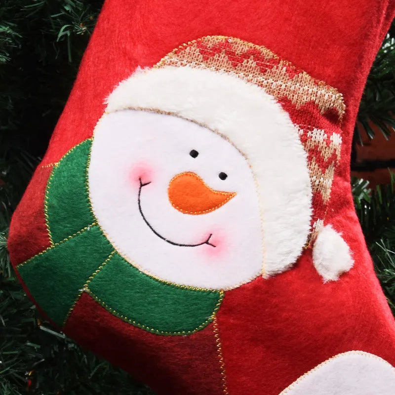 Non-woven fabric Christmas candy bag hanging as a stocking, available in Elk, Old Man, or Snowman print designs.