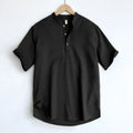 Men's solid colour short sleeve t-shirt in thin cotton linen fabric, shown in optic linen, white, grey green, and black.