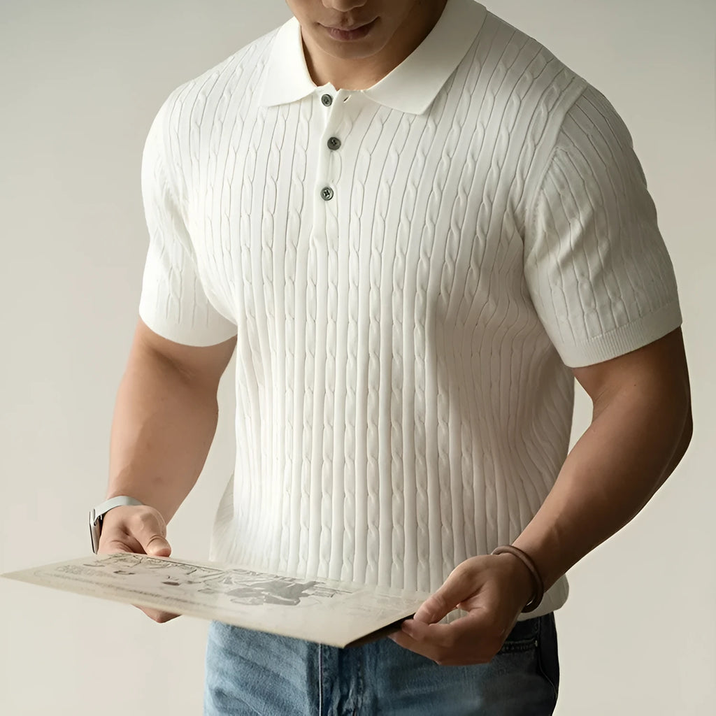 Man wearing a khaki short-sleeve business casual top, showing slim fit and fabric texture.