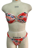 Women's floral printed lace-trim bikini set in blue, shown front and back.