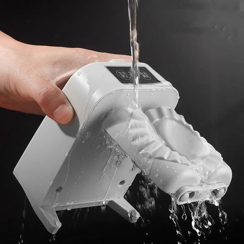 White electric automatic dumpling maker machine with accessories on a kitchen counter.