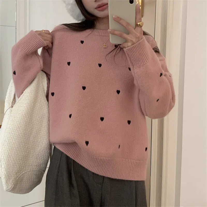 Women's acrylic pullover sweater with embroidery detail in milky white colour