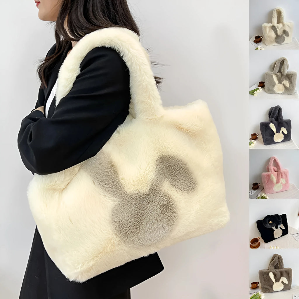 Plush shoulder bag with cartoon rabbit ears design in solid colour