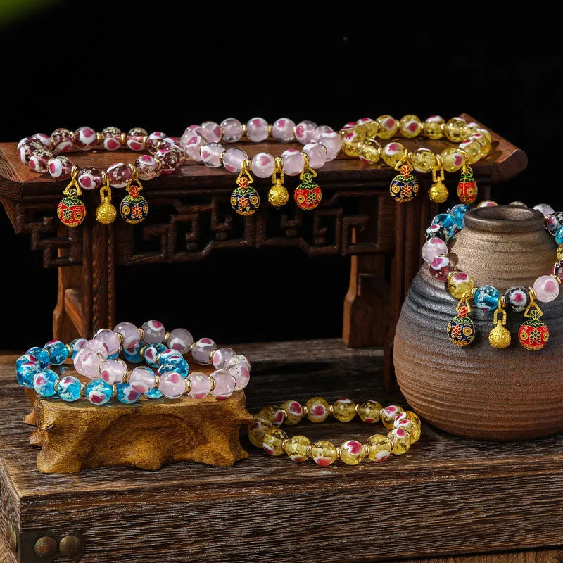 Handmade ancient fluorescent glaze swallowing gold beast heart bracelet in 10mm size