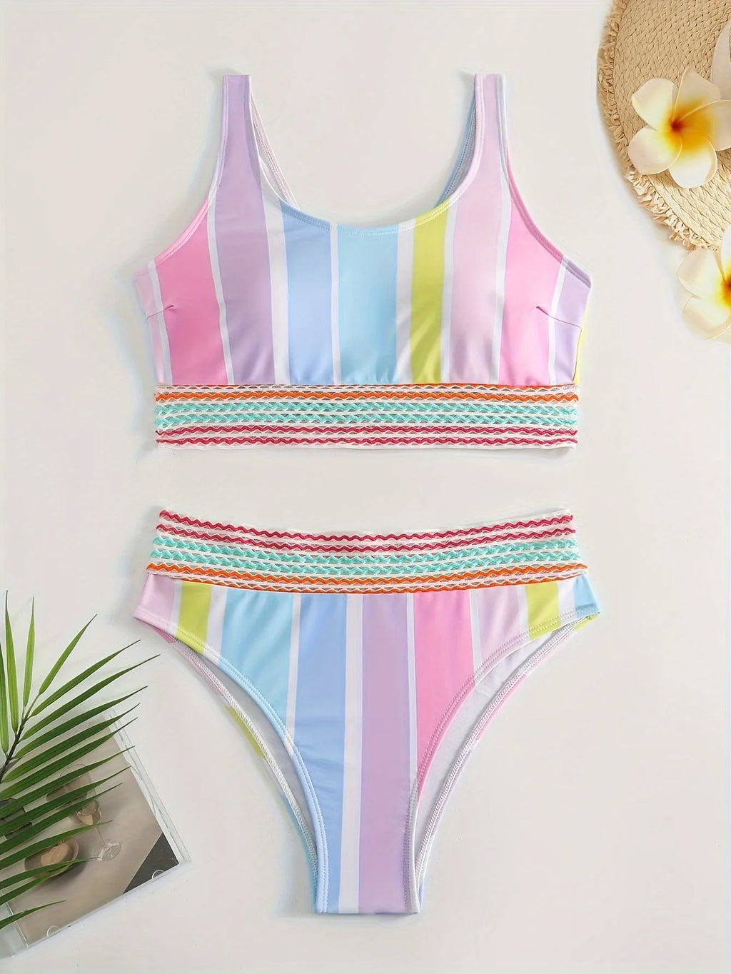 Women's striped two-piece bikini set for swimming and sports.