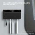 Black toothbrush sterilizer with UV disinfection and automatic drying, wall-mounted on tile with drill-free adhesive