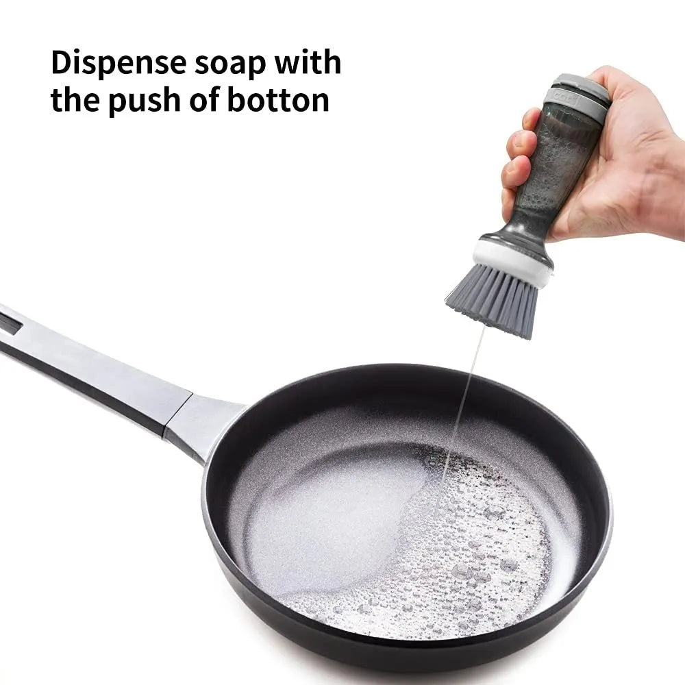 Milk white and mint green pot brush with integrated soap dispenser and replaceable head.