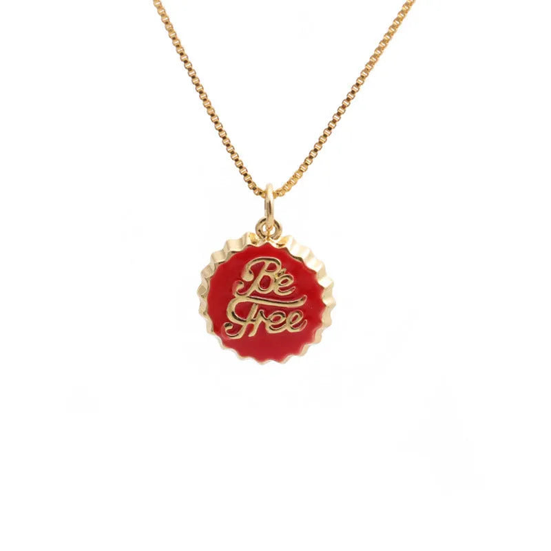 Copper bottle cap pendant necklace with electroplated gold finish on a 40cm box chain.