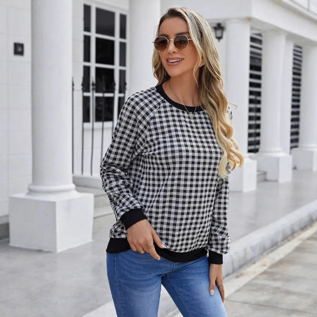 Black long sleeve women's pullover sweater with a Japanese sweet plaid and stripe print pattern.