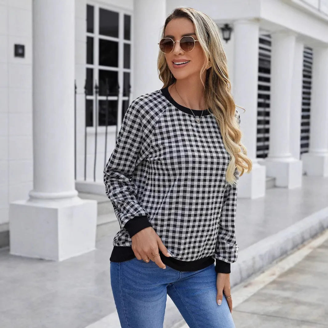 Black long sleeve women's pullover sweater with a Japanese sweet plaid and stripe print pattern.