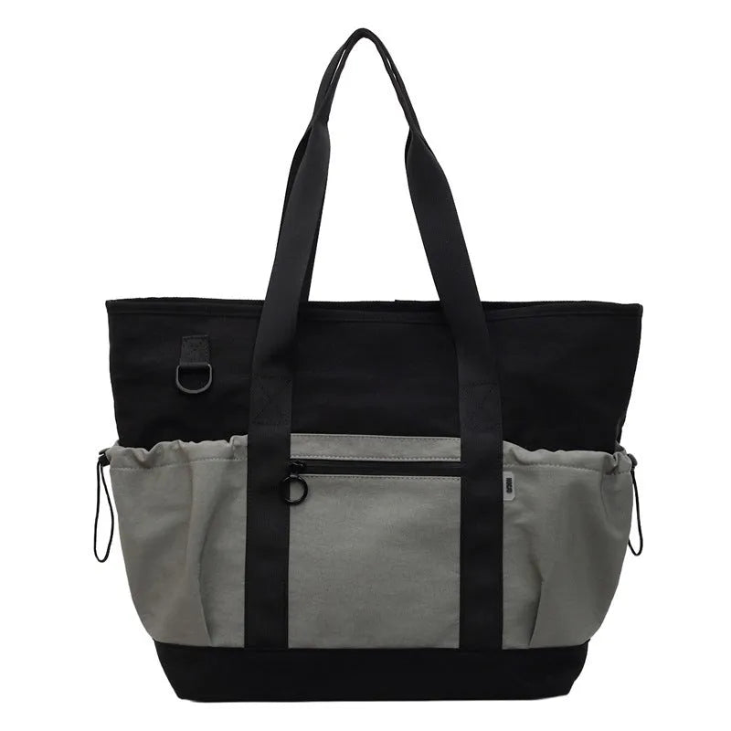 Women's lightweight oxford cloth travel and gym bag in grey colour with letter pattern