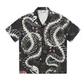 Original snake bone theme floral print on a loose, short sleeve Cuban collar shirt in assorted colours.