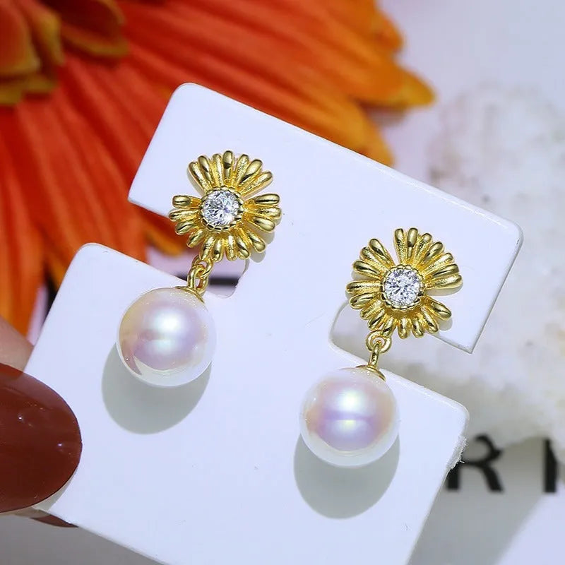 S925 sterling silver baroque flower drop earrings and matching ring holder set on a plain background.