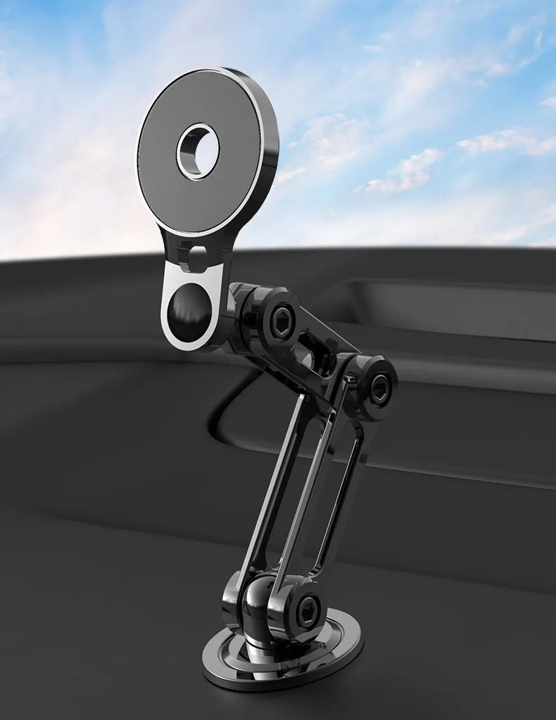 Black magnetic car phone holder mounted on car air vent with phone attached