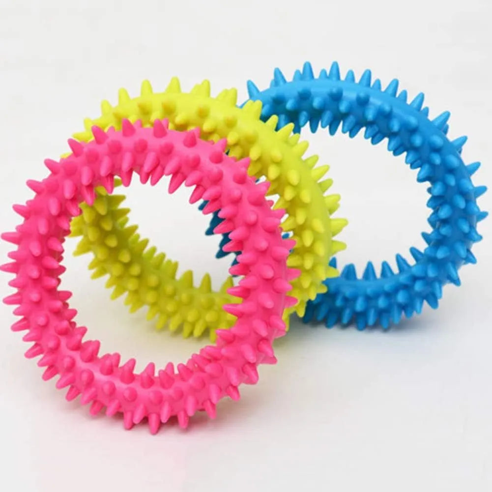 Blue spiky circle ring dog chew toy made of TPR for bite training and dental cleaning.