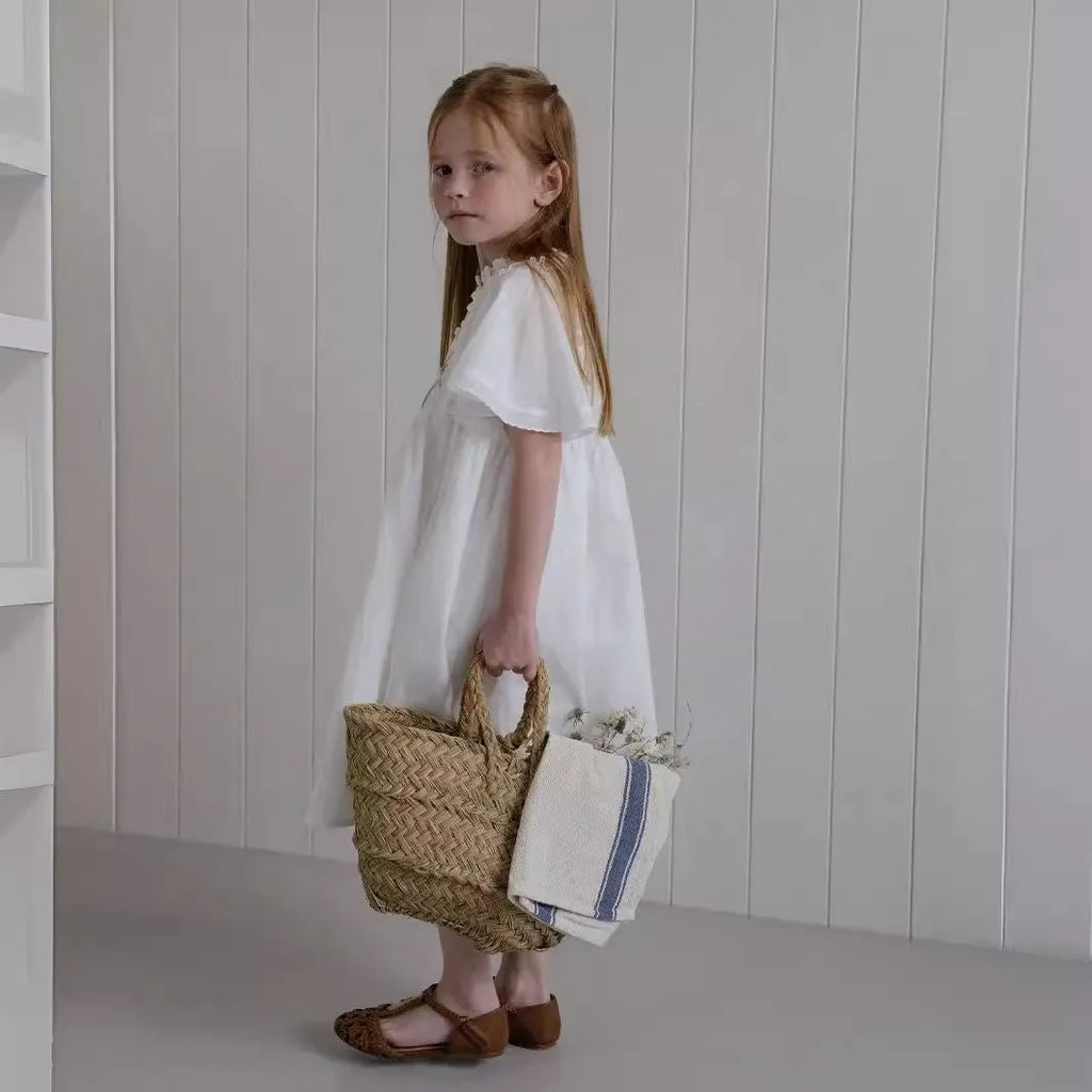 Girls white cotton summer dress with short ruffled sleeves and embroidered skirt detail