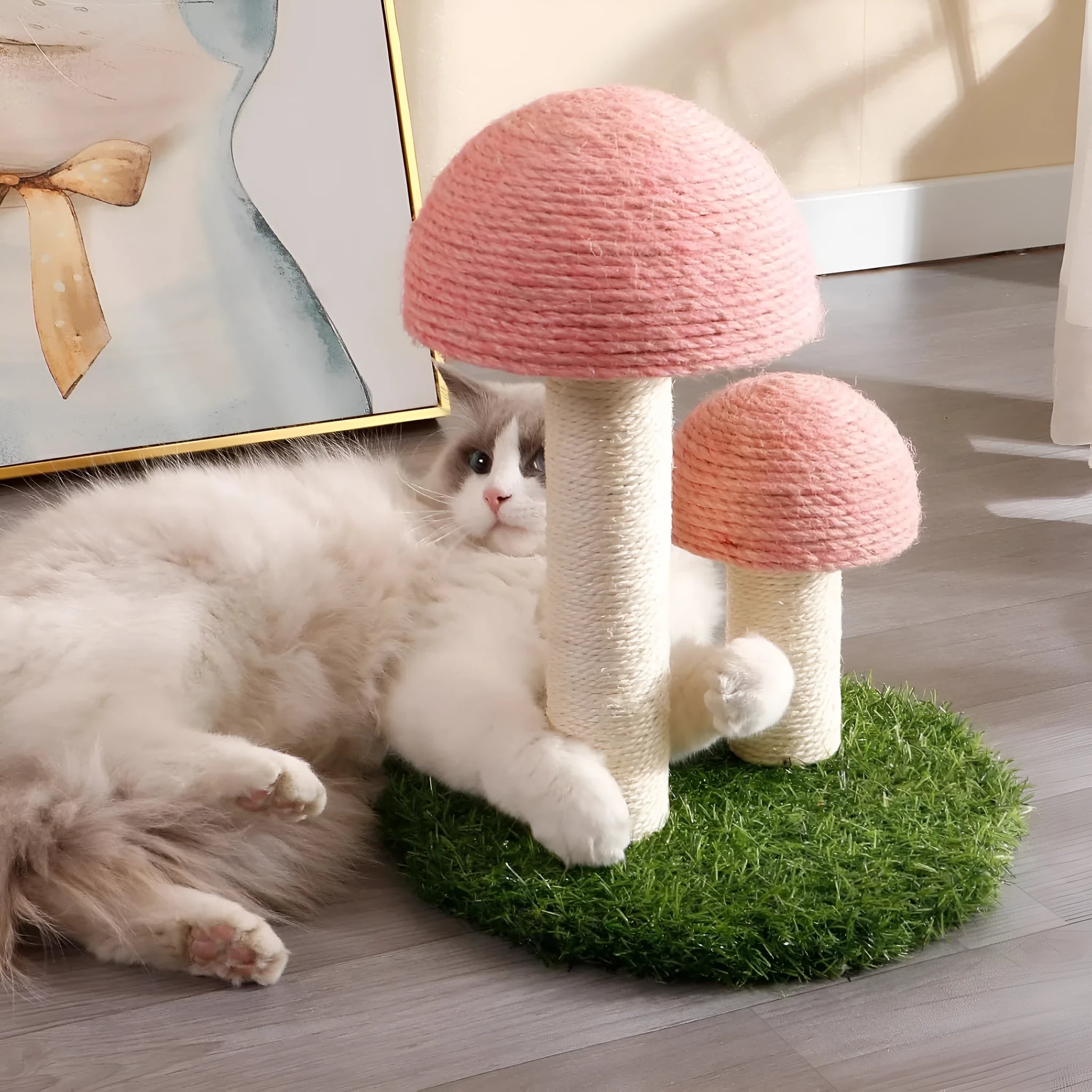 Pink mushroom-shaped cat scratching post with natural sisal covering for small cats up to 1.9kg