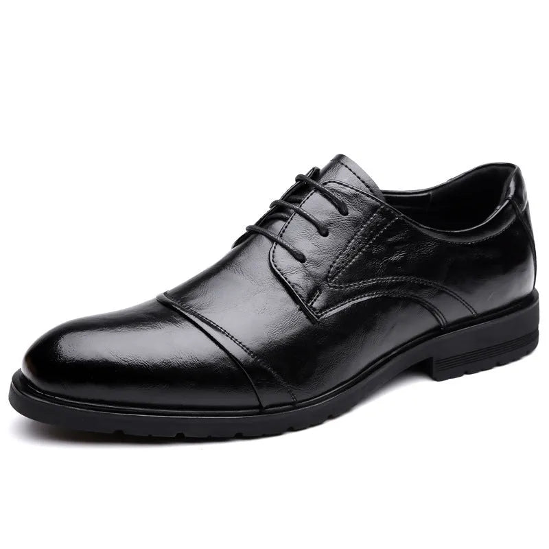Men's business formal leather shoes in black with cow split leather upper, pointed toe, and tassel detail