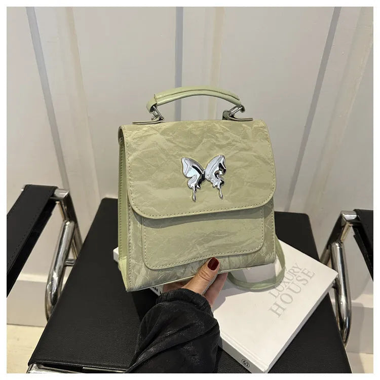Women's preppy style PU backpack handbag with bow detail in choice of six colours