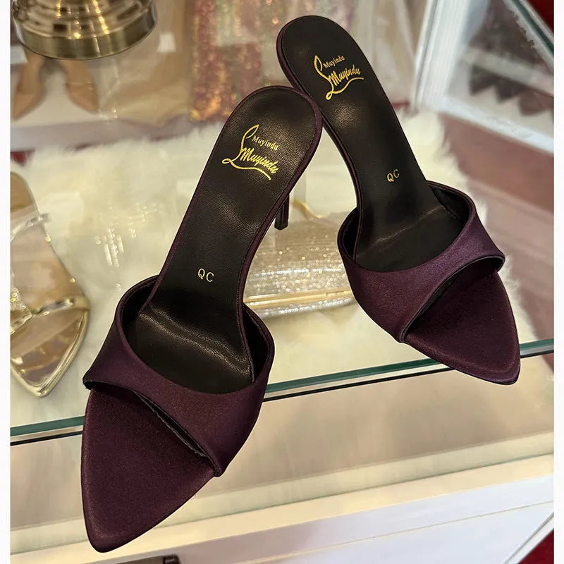 Women's black patent leather pointed toe sandals with an 8cm stiletto heel and ankle strap.