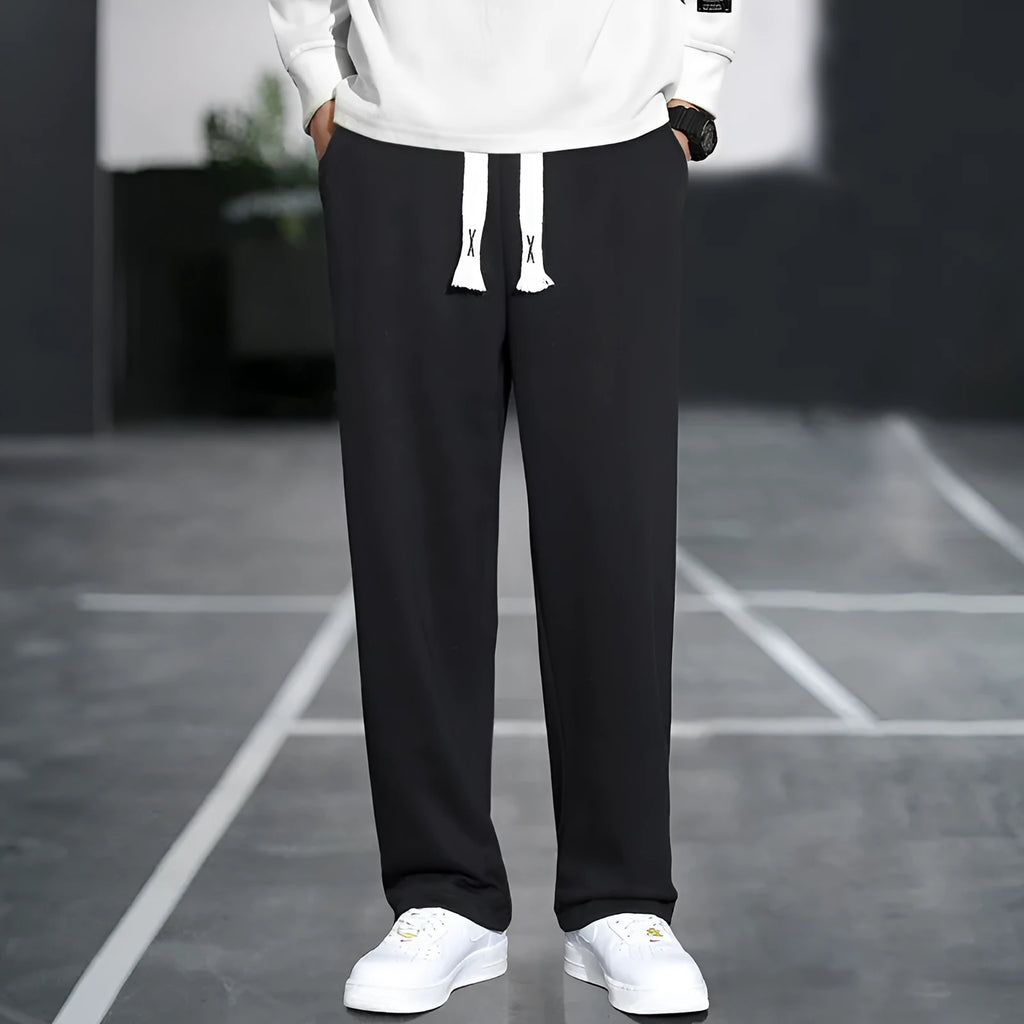 Men's grey bamboo fibre sports trousers with multiple pockets and high waist design