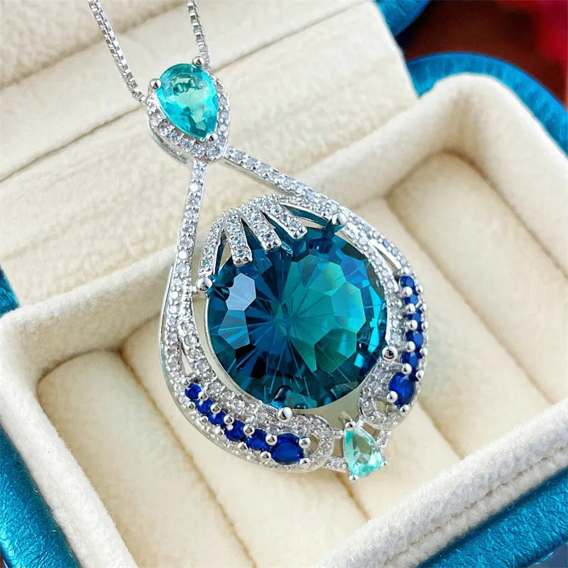 Women's geometric necklace with blue crystal gems on water wave chain