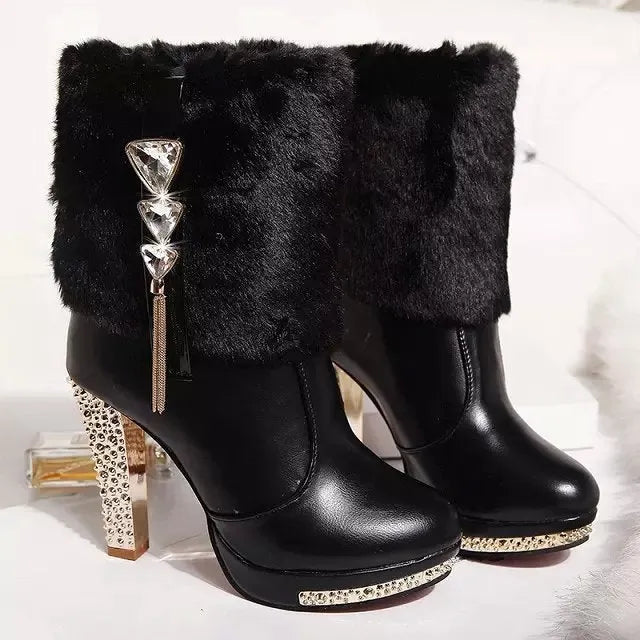 Women's black ankle boots with a high chunky heel on a white background