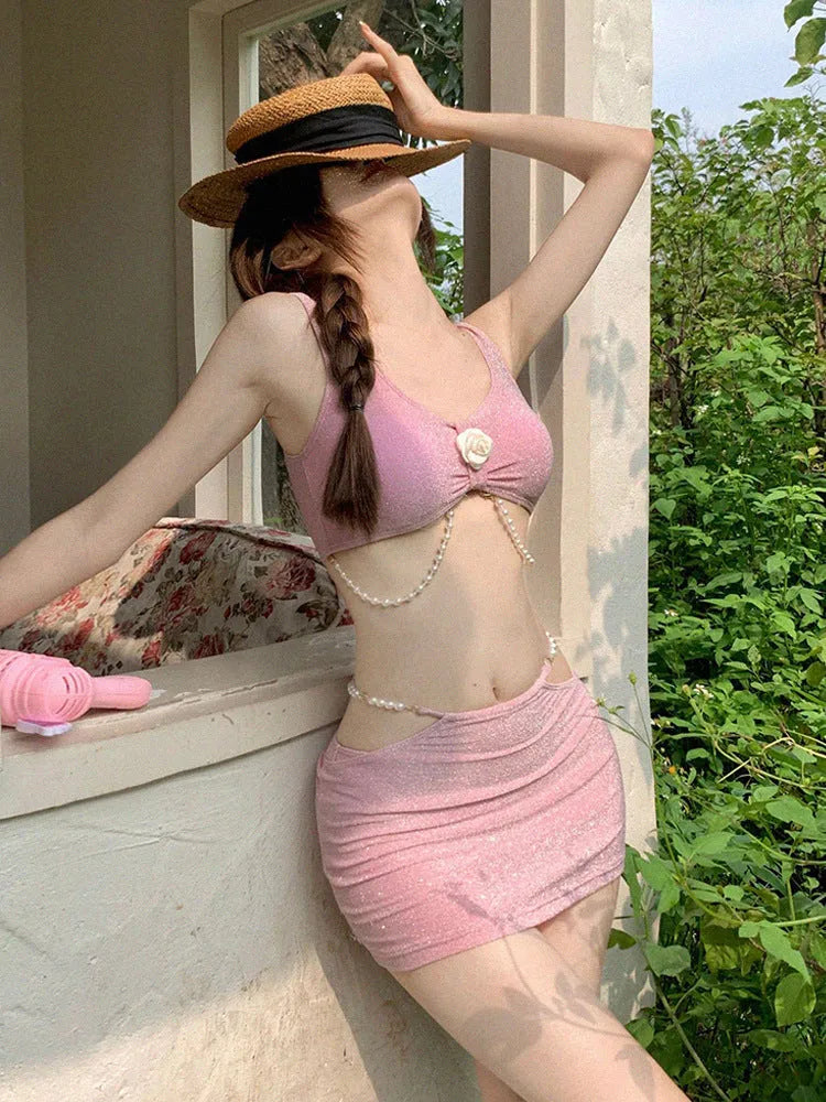 Black and pink women's three-piece polyester bikini set for swimming, shown in Asian sizes S to XL.