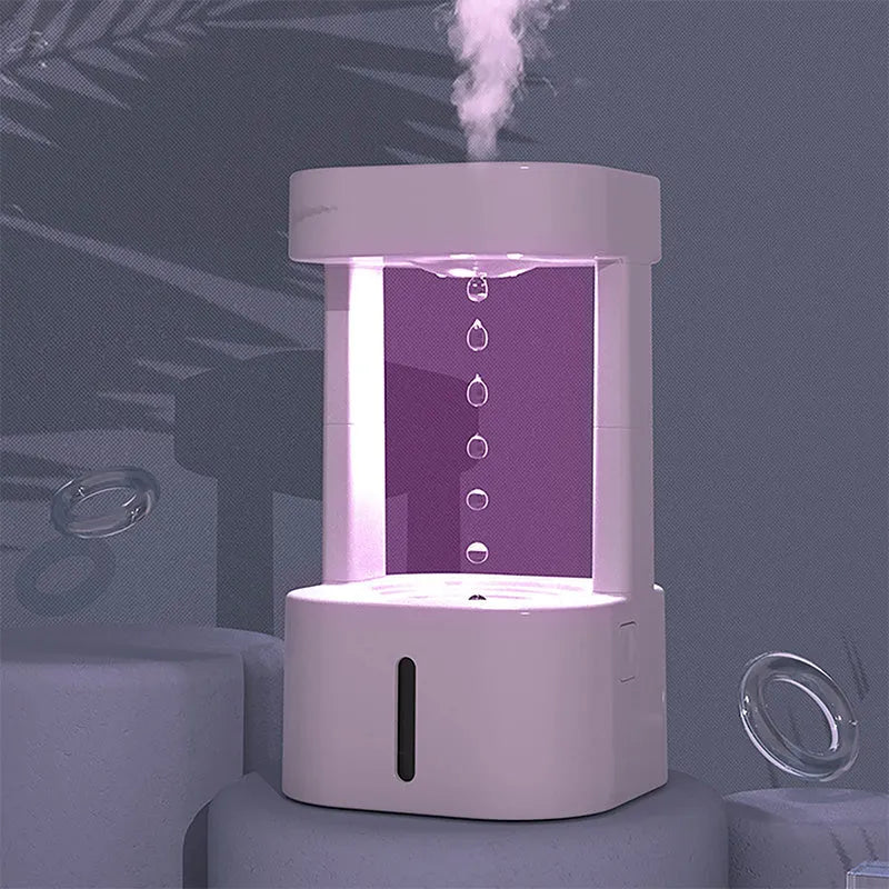 Mini humidifier with anti-gravity water droplets and 580ml tank for bedroom office use