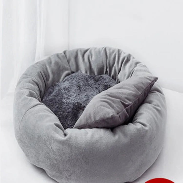 PP cotton filled dog bed in light grey or pink colours with five size options for dogs