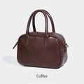 Retro horizontal square black PU leather messenger bag with a single shoulder strap