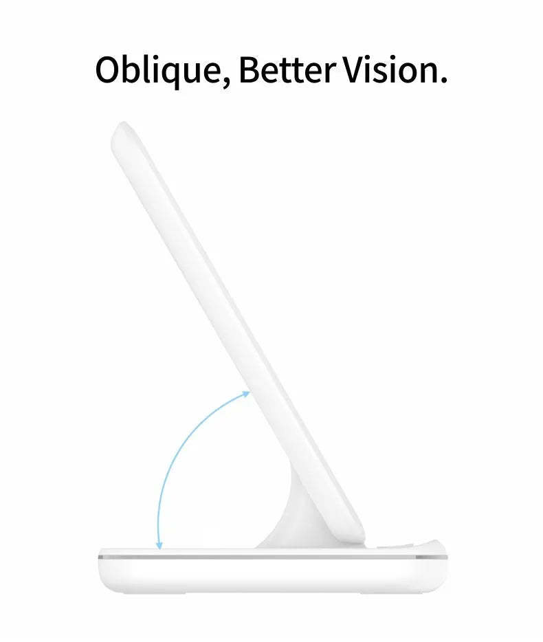 White three-device wireless charging stand on desktop with phone, watch, and headset charging simultaneously