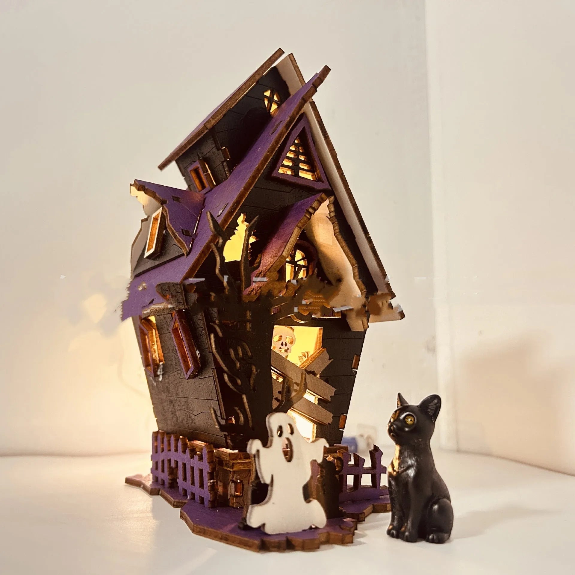Wooden Halloween haunted house table decoration with candlestick design