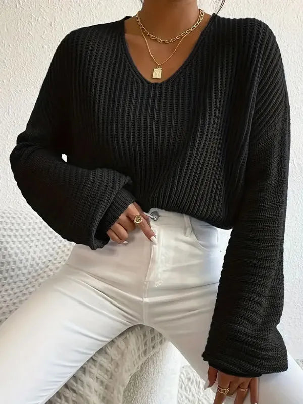 Women's solid colour long sleeve pullover top in a loose casual fit.