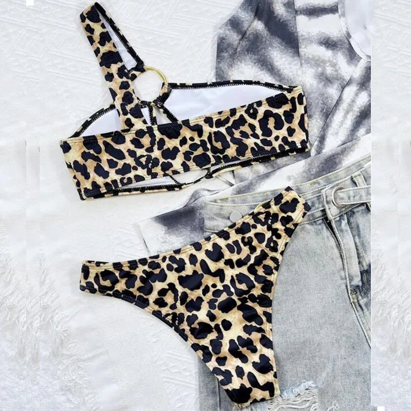 Women's leopard print polka dot bikini top and shorts on a mannequin.