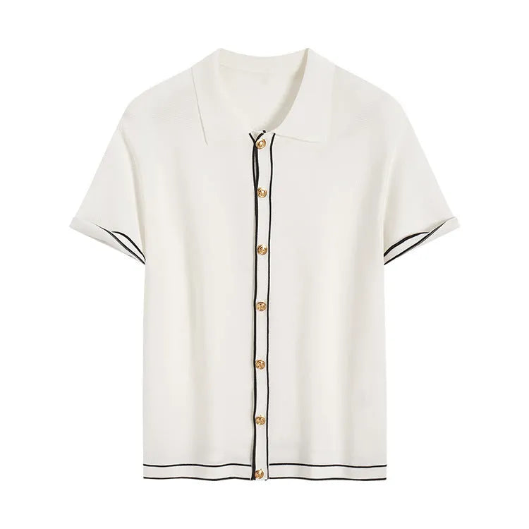 White short sleeve women's cardigan with a dark contrast lapel collar, shown open front.