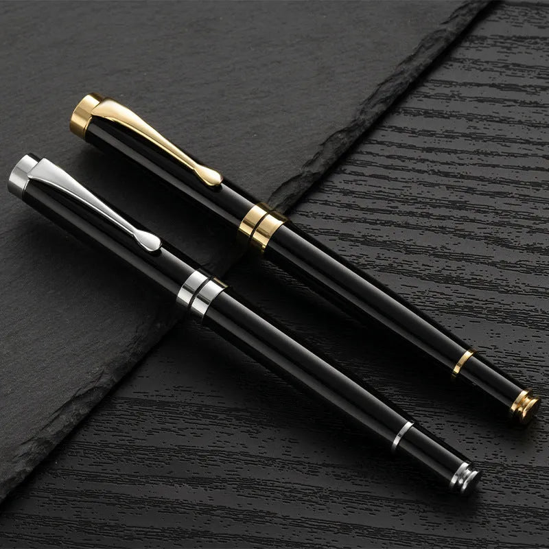 Metal fountain pen with gold clip for calligraphy practice and writing
