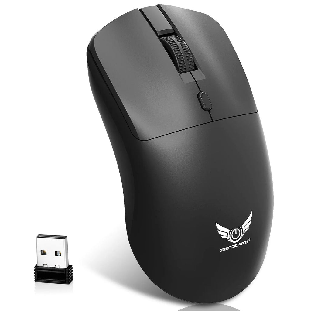 Black wireless mouse with a three-gear audio button on a desk next to a laptop.