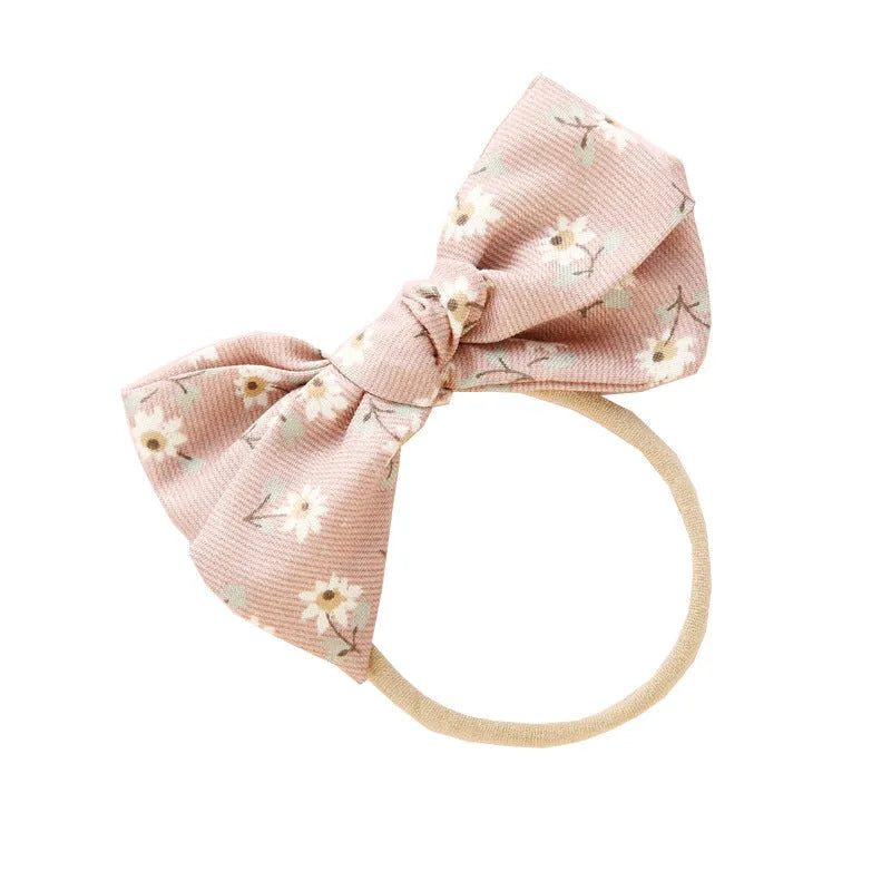 Children's fabric hairband with knotted bow design in multiple colours from Princess series