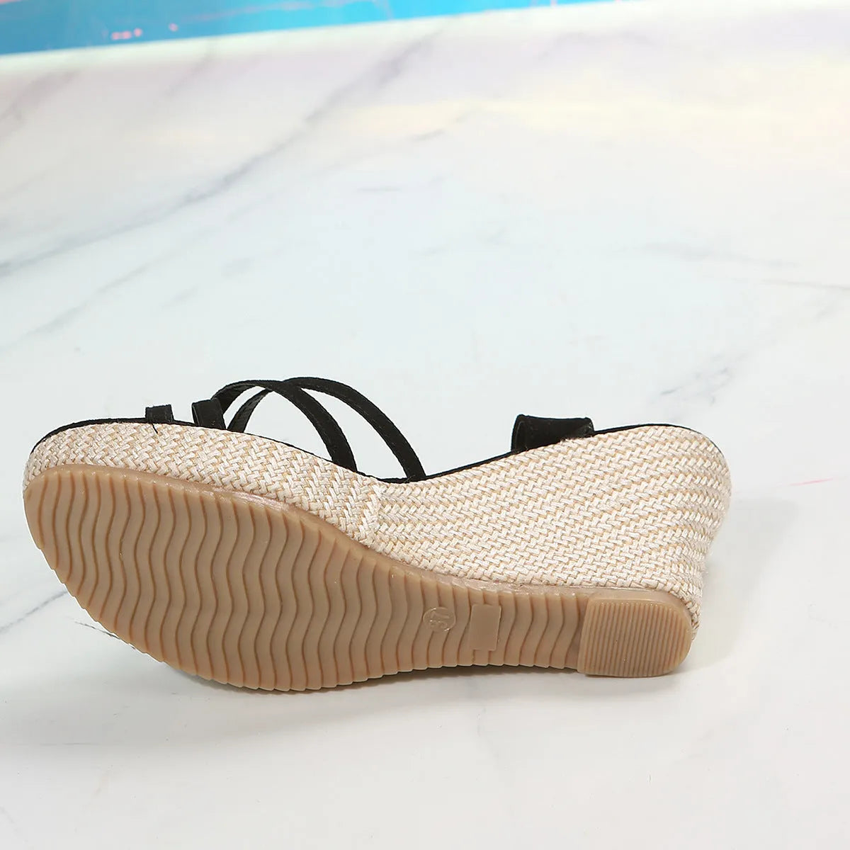 Women's wedge sandals with fish mouth toe and cloth upper in black and beige