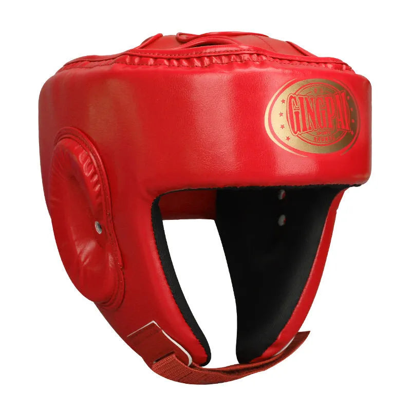 Red fully enclosed boxing helmet with jaw protection on a white background.