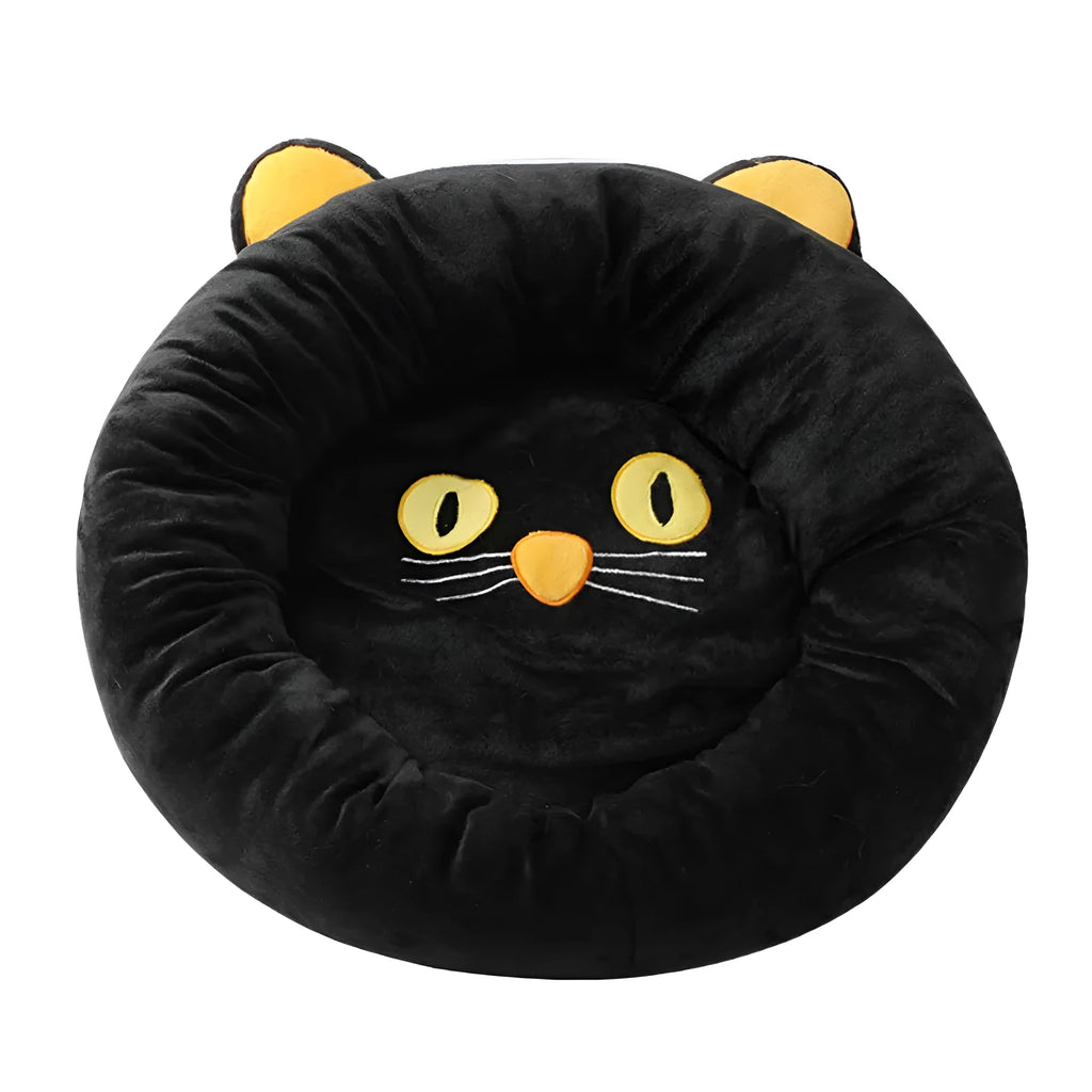 Black cat shaped velvet pet bed with raised edges for feline head and neck support