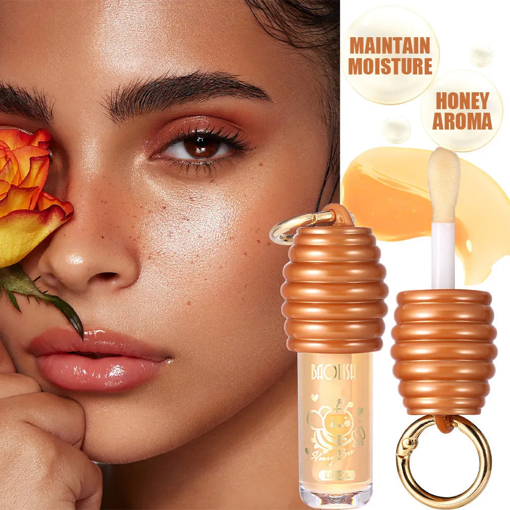 Honey lip gloss with keychain attachment in portable packaging