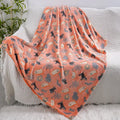 Colourful cartoon-print flannel blanket for children, shown covering an air conditioner.