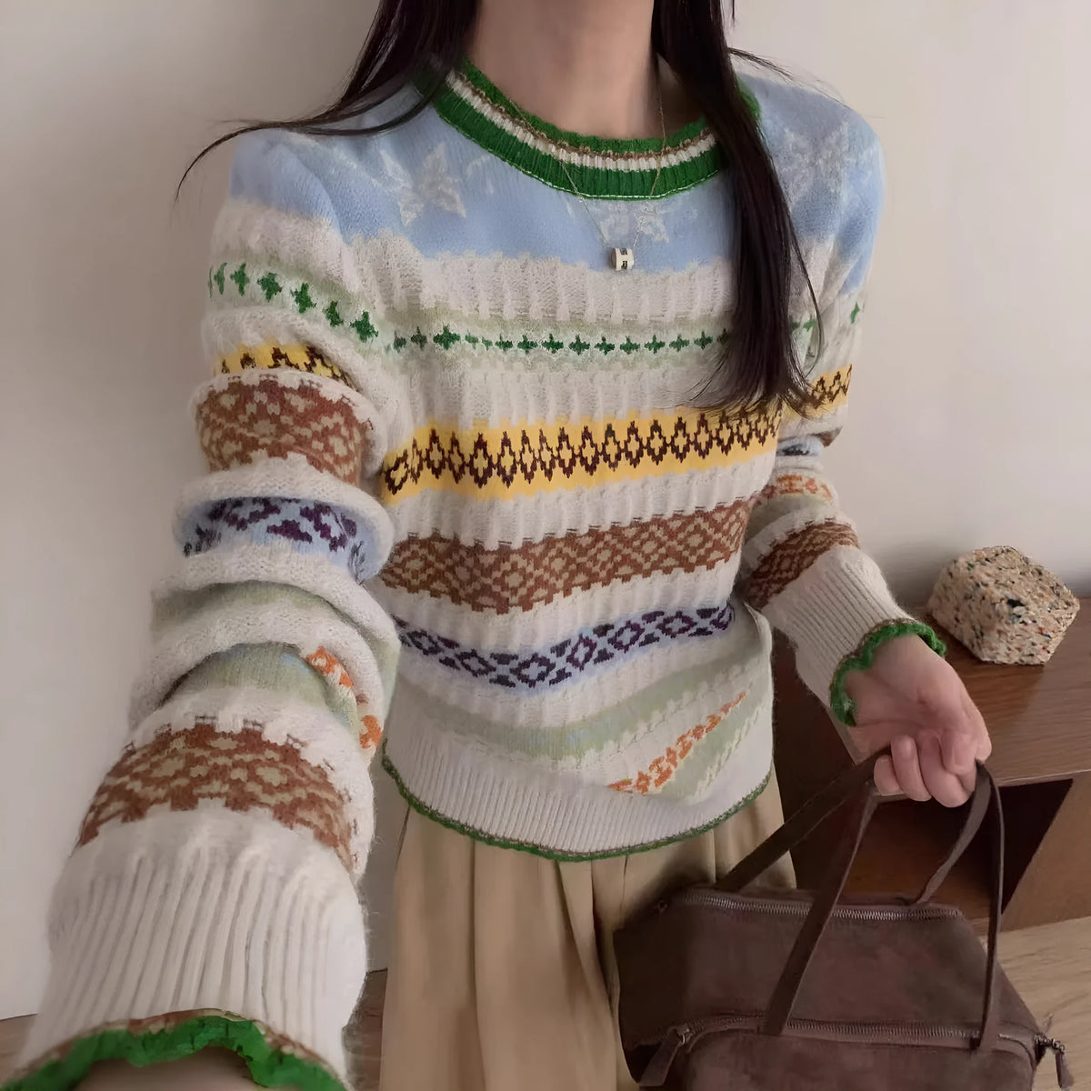 Women's loose jacquard knitted sweater in free size with splicing detail, shown as long sleeve or vest option