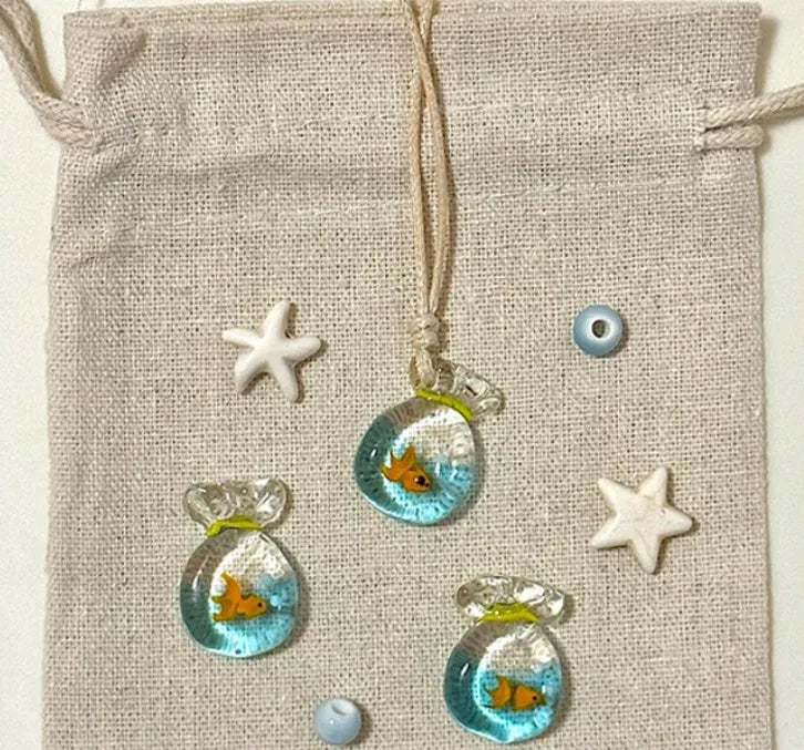 Women's necklace with a coloured glaze Skirt Everyday Joker pendant on a cotton and linen clavicle chain.
